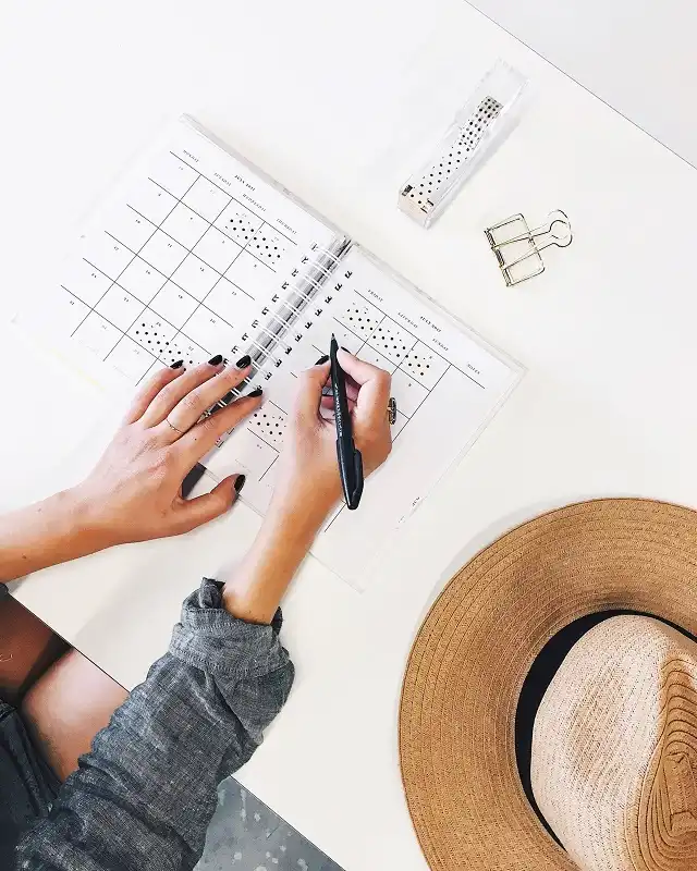 Girl writing on table - Do I need ERP - Gosoft